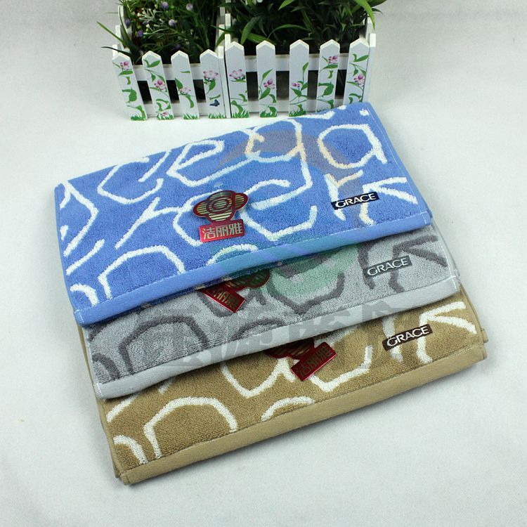 洁丽雅 9218 74cm*34cm 提花面巾经典面巾 加厚吸水洗脸毛巾 提花花纹全棉柔软面巾 颜色随机